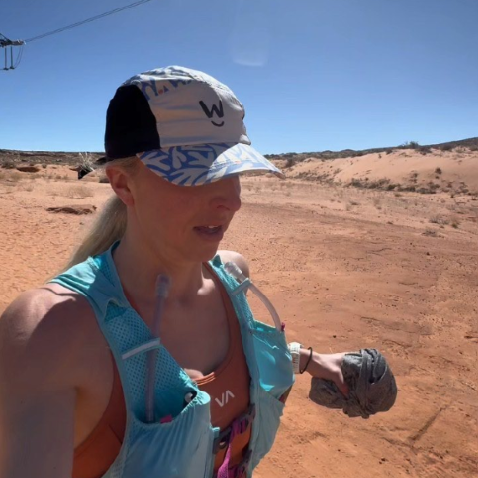 Desert trail run wearing the Coconut Cool Running Cap that provides sun protection, breathable and sweat wicking