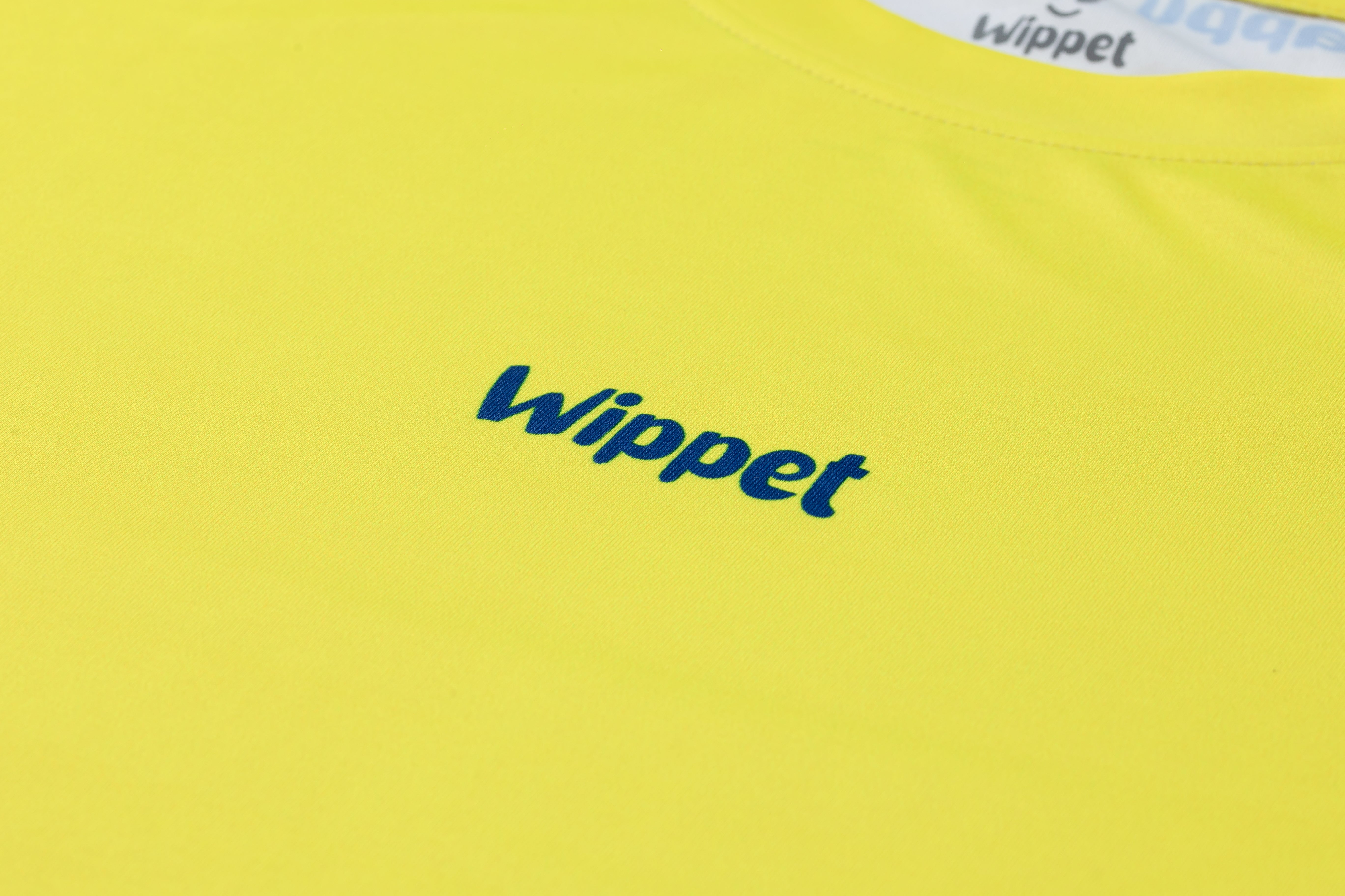 Wippet Running Tee Blazing Yellow – Unisex ultra-light sweat-wicking, breathable running shirt with UPF50+ sun protection and eye catching colors and patterns close up