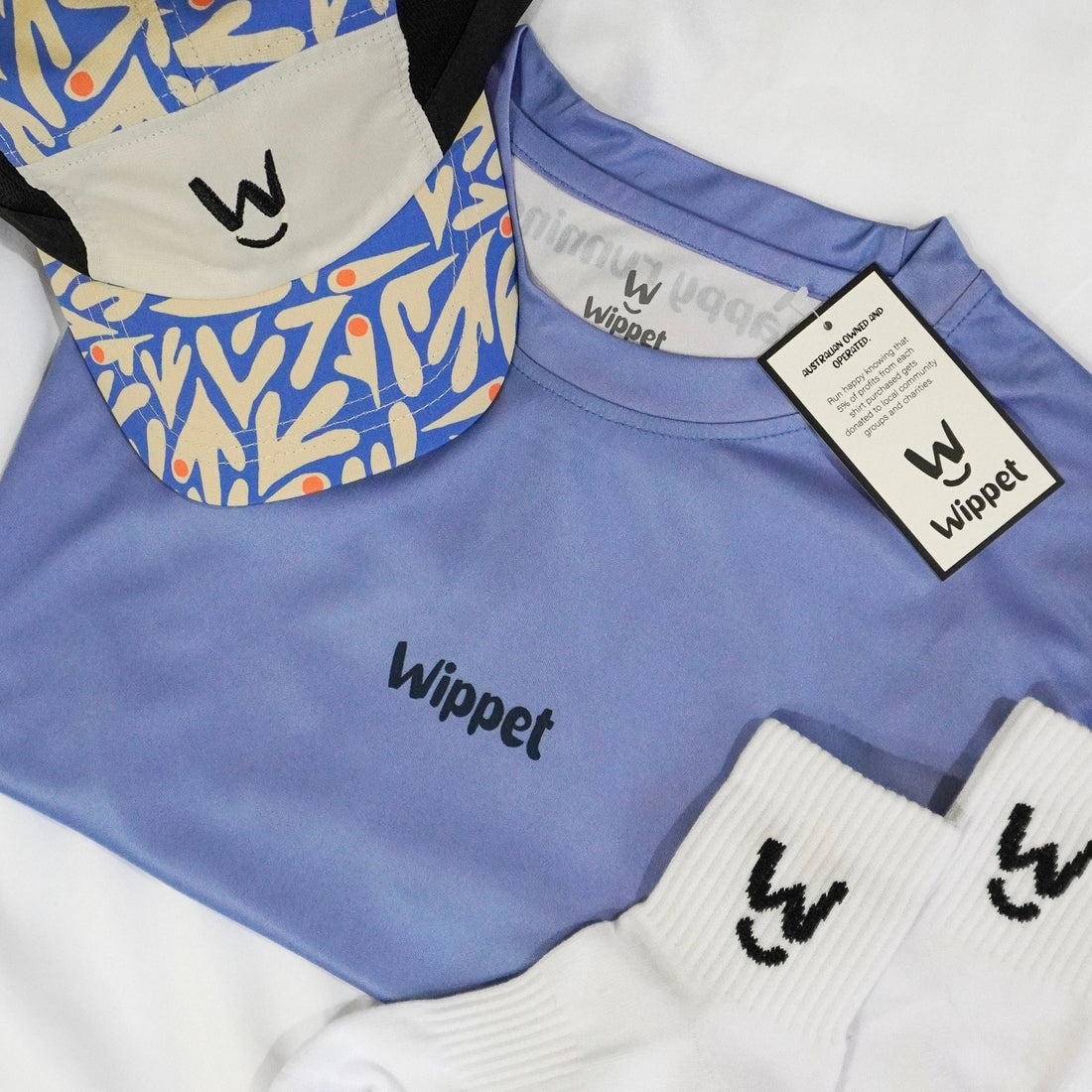 Wippet-running-apparel-functional-quality-unisex-male-female-breathable-light-sweat-wicking-happy-fun-colourful-bright-UPF50+-eco-sock-cap-shirt