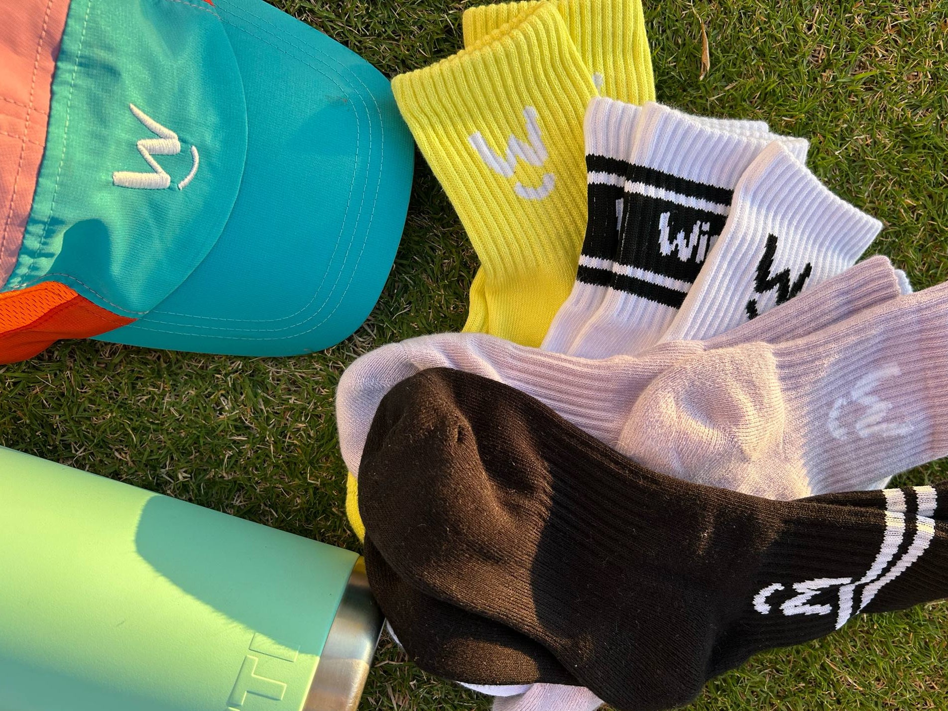 Wippet Running Socks and Cap – Unisex ultra-light sweat-wicking, supportive, breathable, odour resistant running shirt with UPF50+ sun protection and bold colors and patterns