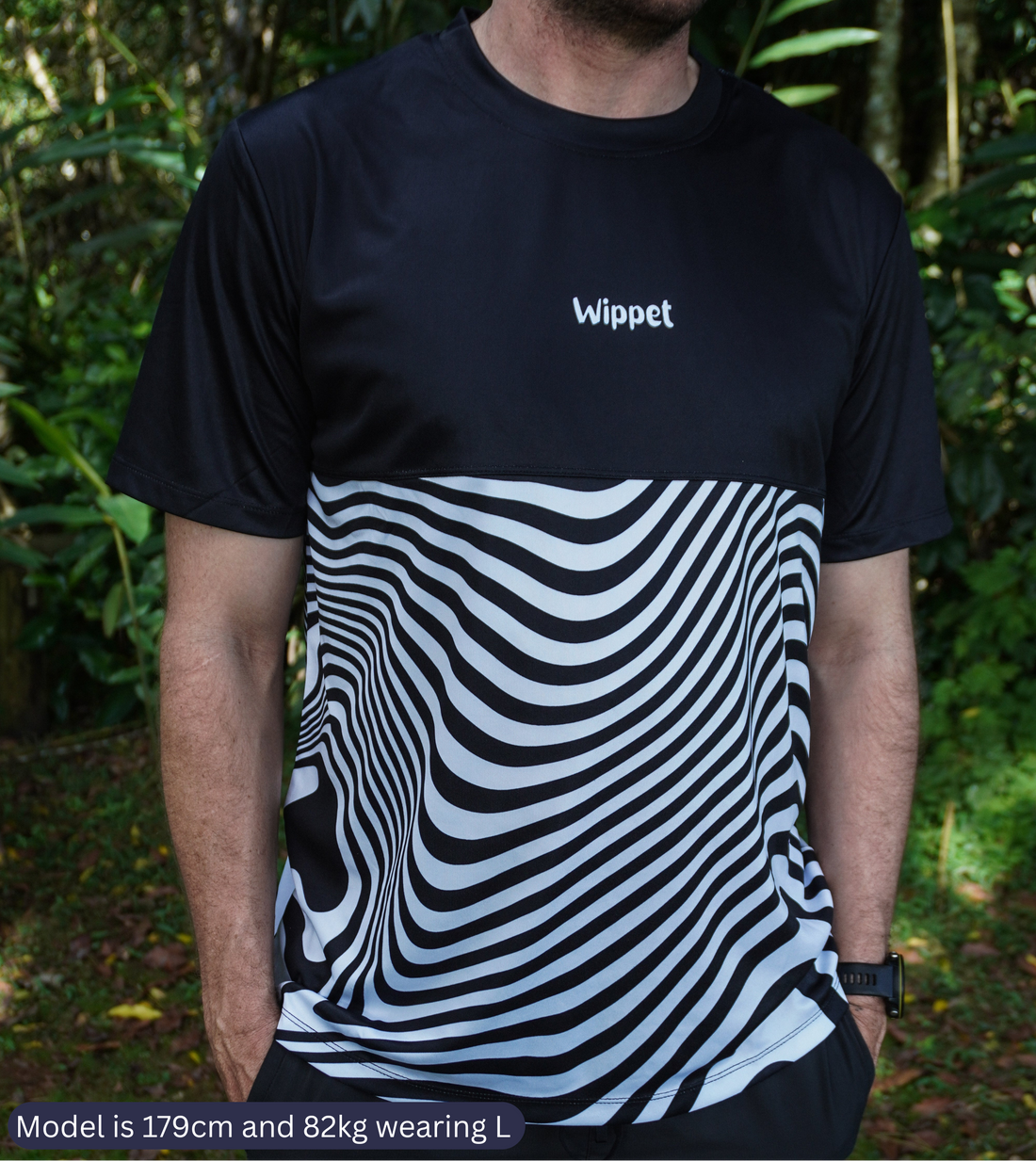 Wippet everyday Trippy Wave running shirt that is black and white, breathable, sun protection and bright and fun for running