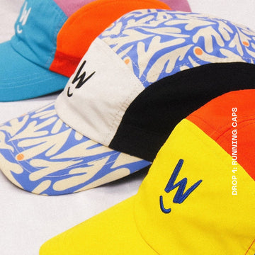 Men's and women's running caps with UPF50+ sun protection, moisture-wicking technology, breathable mesh and fun colour panelling by Wippet